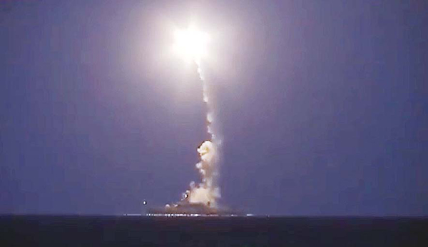 Russian warship launching a cruise missile in the Caspian Sea during a strike against Islamic State (IS) group’s positions in Syria.