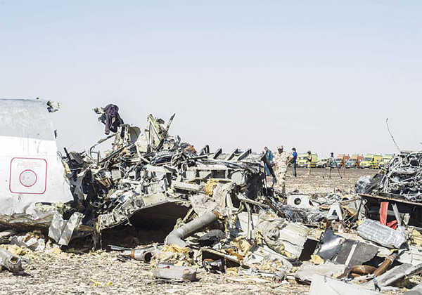 Debris belonging to the A321 Russian airliner are seen at the site of the crash in Wadi el-Zolmat, a mountainous area in Egypt’s Sinai peninsulaon Nov 1. International investigators began probing why a Russian airliner carrying 224 people crashed in Egypt’s Sinai peninsula, killingeveryone on board, as rescue workers widened their search for missing victims. (AFP)