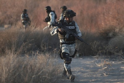 Mexico deploys first of 10K National Guard troops to US border after ...