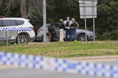 2 police officers killed and another shot in rural Australian town