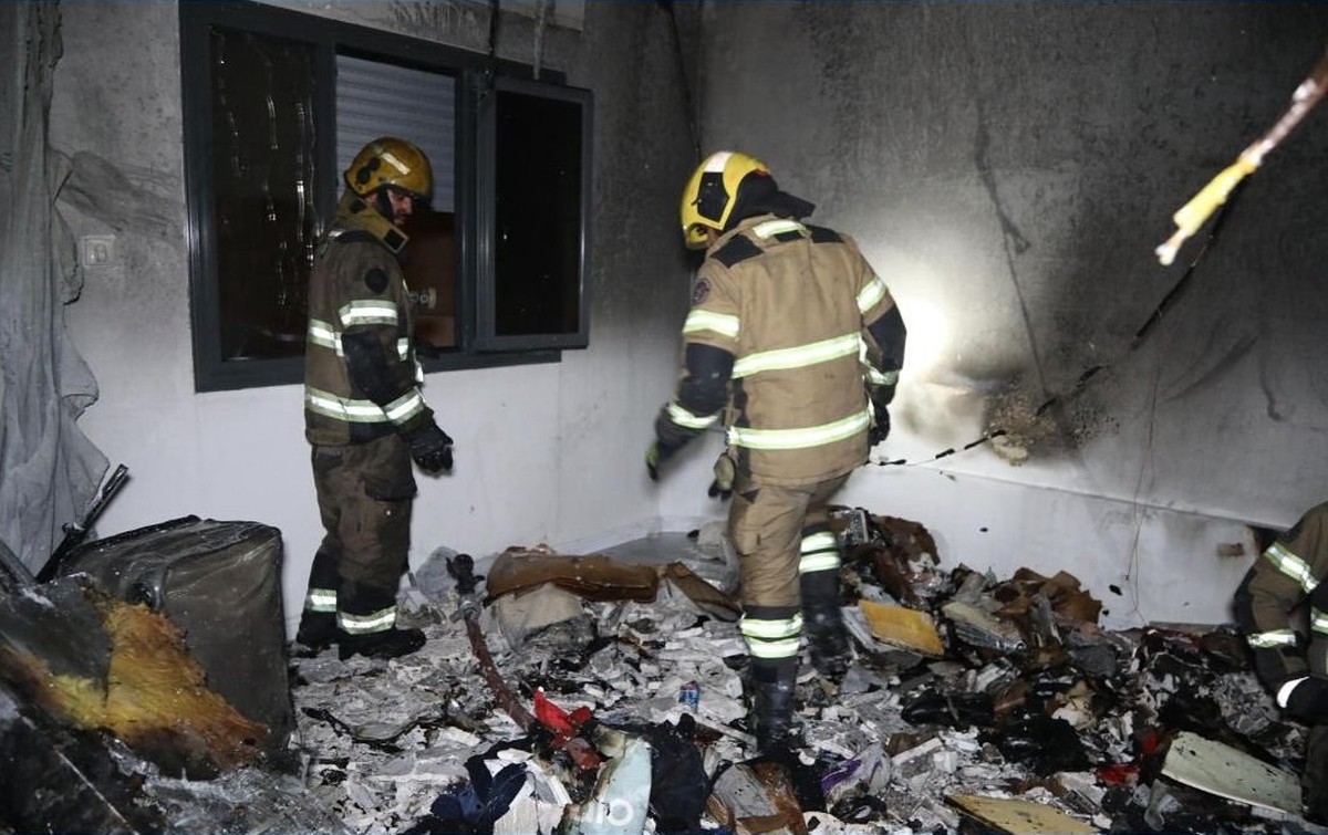 Firefighters contain a house fire caused by gas leak; one person injured