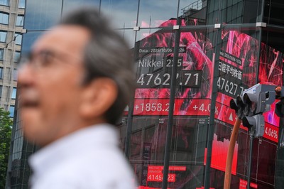 Asian markets mostly higher in quiet holiday trading