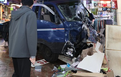 Truck crash in South Korea market kills 2 people and injures 18: officials