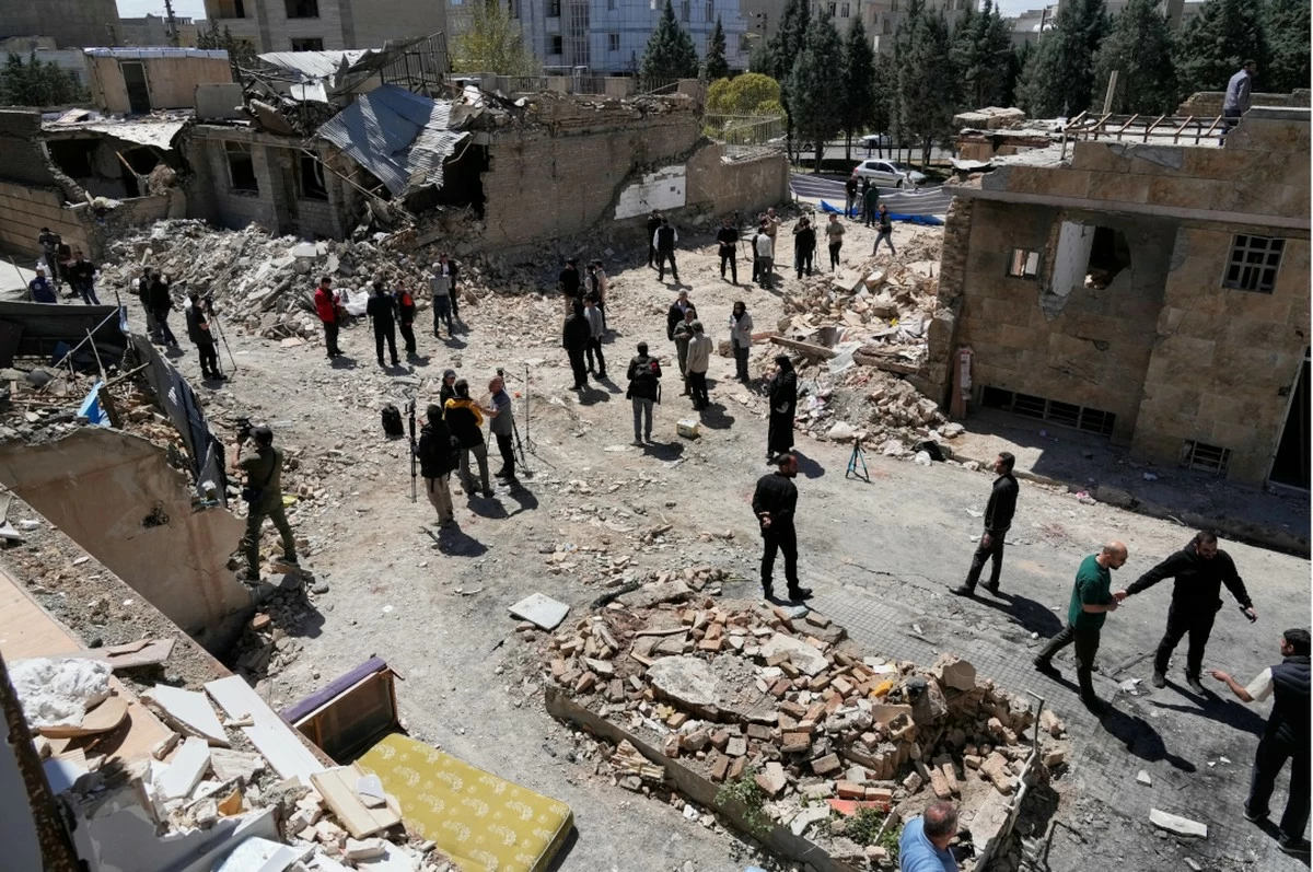 Explosions, Checkpoints and Coffee: The Two Faces of Tehran at War