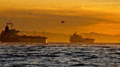 Iranian gunboats fire on tanker in Strait of Hormuz, British military says