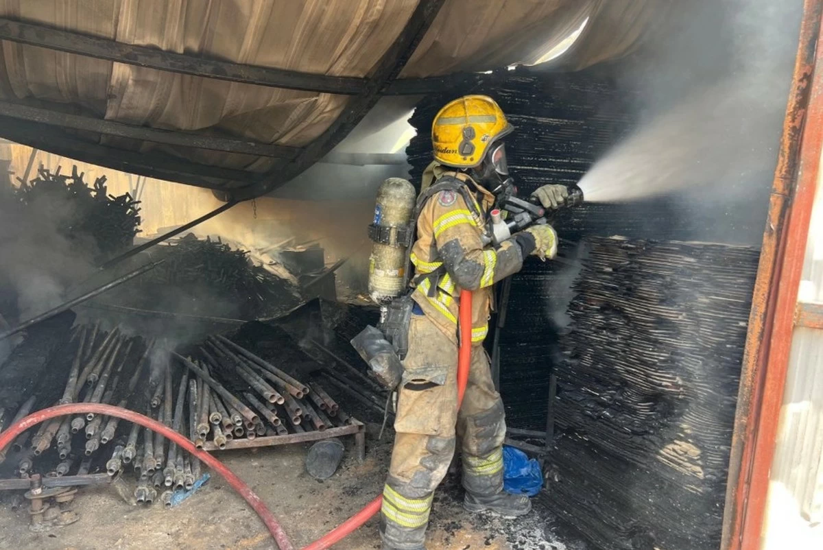 Firefighters Contain Warehouse Blaze in Al-Dajij