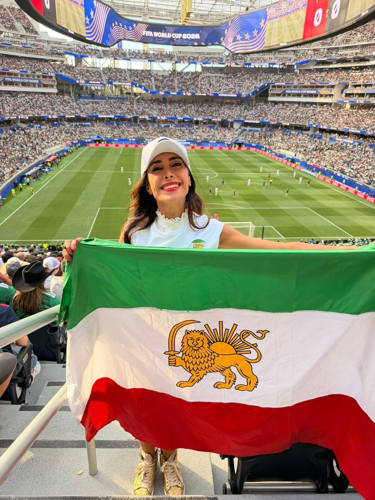 Lion and Sun Flag and Protest Banner Draw Attention During Iran-New Zealand World Cup Match in Los Angeles