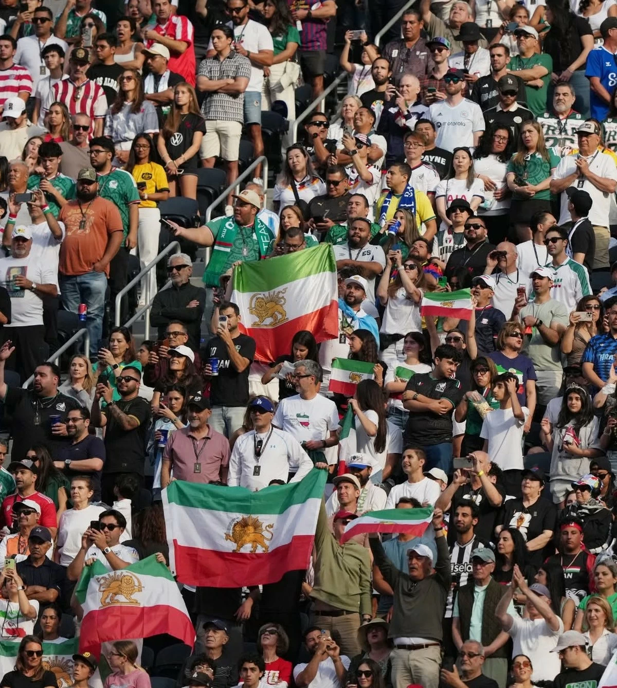 Lion and Sun Flag and Protest Banner Draw Attention During Iran-New Zealand World Cup Match in Los Angeles