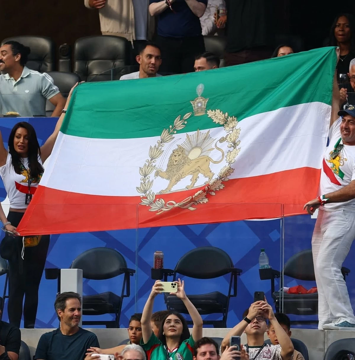 Lion and Sun Flag and Protest Banner Draw Attention During Iran-New Zealand World Cup Match in Los Angeles