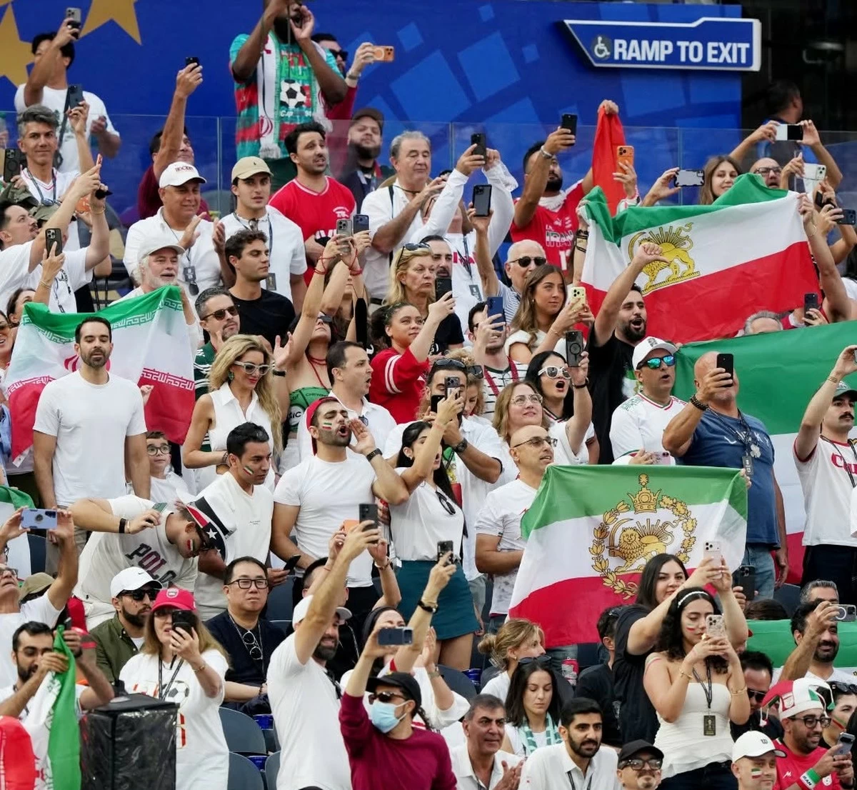 Lion and Sun Flag and Protest Banner Draw Attention During Iran-New Zealand World Cup Match in Los Angeles