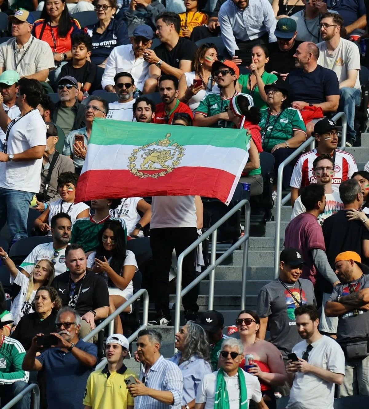 Lion and Sun Flag and Protest Banner Draw Attention During Iran-New Zealand World Cup Match in Los Angeles