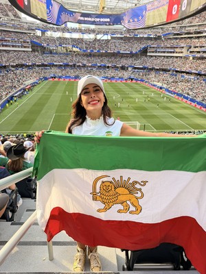 Lion and Sun Flag and Protest Banner Draw Attention During Iran-New Zealand World Cup Match in Los Angeles