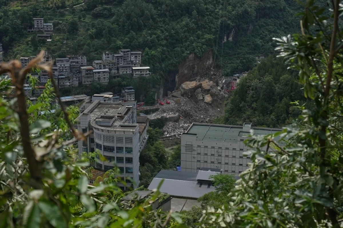 Rescuers in China search rubble for survivors of landslide that killed 8 and left 34 missing