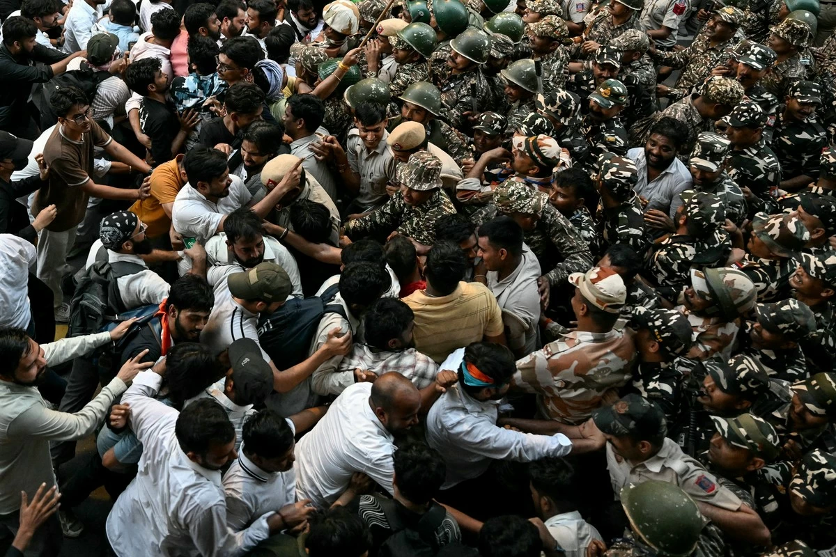 India's Democracy in Chains? Delhi Police Brutality Draws Fierce Opposition