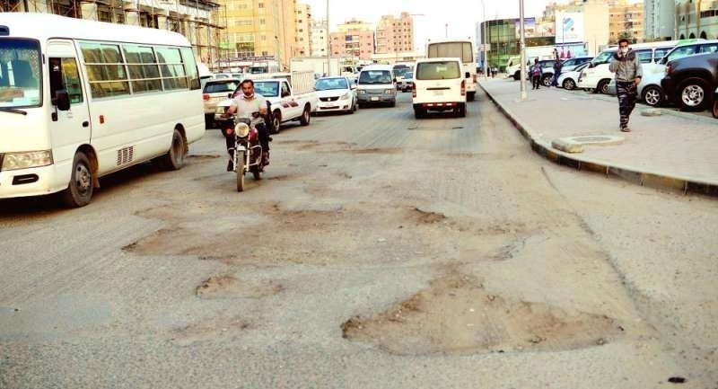 Delay in road repairs queried