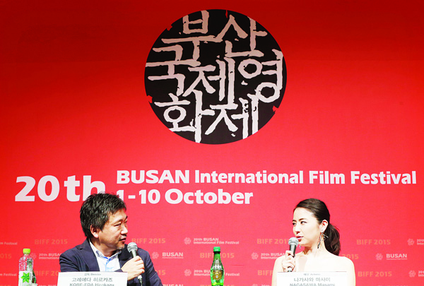 Japanese actress Masami Nagasawa (right), talks with Japanese director Hirokazu Koreeda in the Gala Presentation ‘Little Sister’ during the Busan International Film Festival in Busan, South Korea, on Oct. 4. (AP)