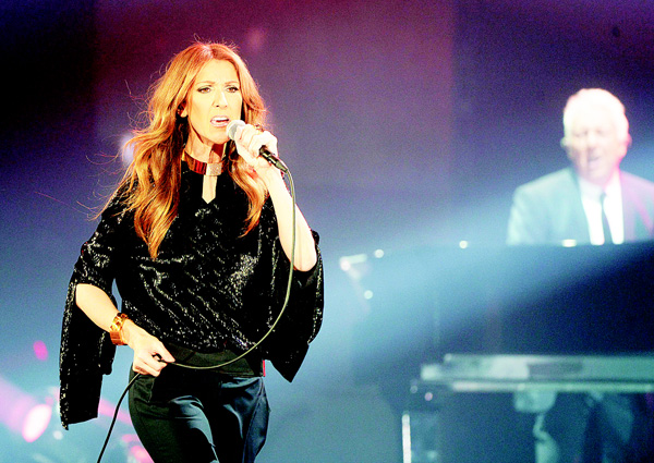 This file picture taken on Nov 25, 2013 shows Canadian singer Celine Dion performing during her first of seven shows scheduled until Dec 5 at the Bercy’s Palais Omnisports in Paris. (AFP)