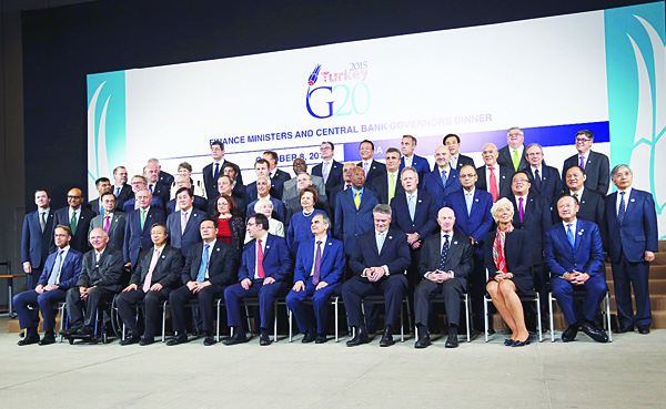 Finance Ministers and Central Bank Governors from the G20 pose for a group picture with International Monetary Fund (IMF) Managing Director Christine Lagarde (second right front row), and World Bank President Jim Yong Kim (first right front row), in Lima, Peru. The world’s finance ministers and central bankers are in Lima for the joint annual meetings of the World Bank and IMF that run through Sunday. (AP)