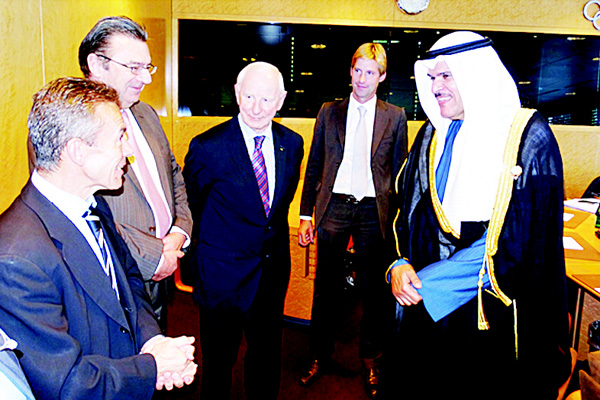 Kuwait Minister of Information and Minister of State for Youth Affairs Sheikh Salman Sabah Salem Al-Humoud Al-Sabah with members of International Olympic Committee. (KUNA)