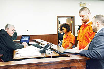 Sarah Ferguson and Joseph Irwin stand in front of Judge Bill M. Virkler during a hearing on Oct 16, in New Hartford, NY. Bruce Leonard and his wife Deborah Leonard have been charged with fatally beating their 19-year-old son inside a church, while Ferguson and Irwin are two of four fellow church members who have been charged with assault in an attack that also left the young man’s brother severely injured. (AP)