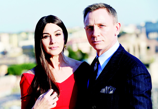 A file picture taken on Feb 18, 2015 shows Italian actress Monica Bellucci (left), and British actor Daniel Craig posing during a photocall to promote the 24th James Bond film ‘Spectre’ at Rome’s city hall. (AFP)