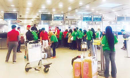 The Pinoys at the check-in counter