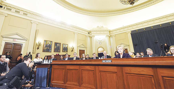 Former US secretary of state and Democratic presidential hopeful Hillary Clinton testifies before the House Select Committee on Benghazi on Capitol Hill in Washington, DC