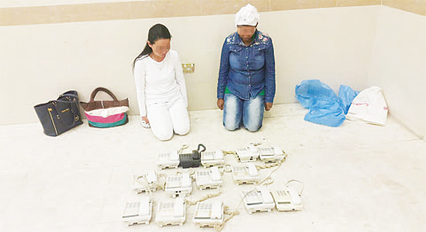 Members of the gang and some of the gadgets seized.