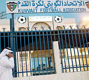 A man walks past the Kuwaiti Football Association (KFA)’s headquarters on Oct 17, 2015, in Kuwait City. (AFP)