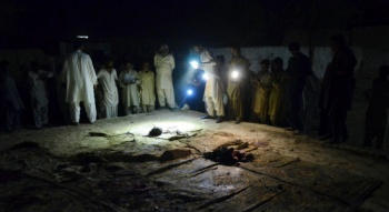 Pakistani Shiite Muslims gather at a mosque after suicide bomb attack in the town of Chalgari in restive Baluchistan, some 170 kms southeast of the provincial capital, Quetta on Oct 22. A suicide bomber blew himself up in a mosque killing at least 10 Shiite minority Muslims, including six children, and wounded 12 others in a remote southwestern Pakistani town, officials said. (AFP)