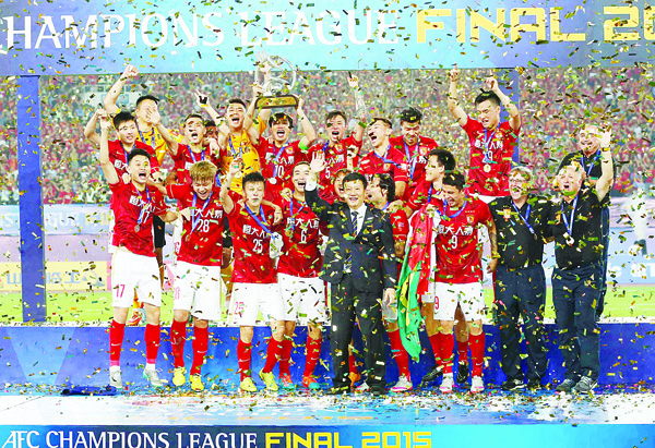 China’s Guangzhou Evergrande celebrate their win in the AFC Champions League football final against UAE’s Al Ahli in Guangzhou, in southern China’s Guangdong province on Nov 21. China’s Guangzhou Evergrande beat Al Ahli of UAE 1-0 to earn their second AFC Champions League title in three years. (AFP)