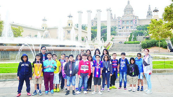 Students and coaches tour around the center of Barcelona in Spain.