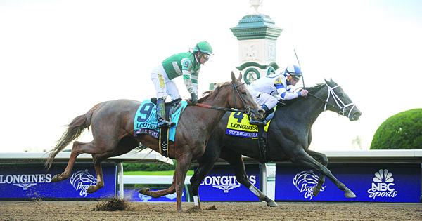 Jockey Javier Castellano, on Stopehargingmaria, wins the Longines Breeders’ Cup Distaff, on Oct 30, at Keeneland Racecourse in Lexington, Kentucky. (AP)