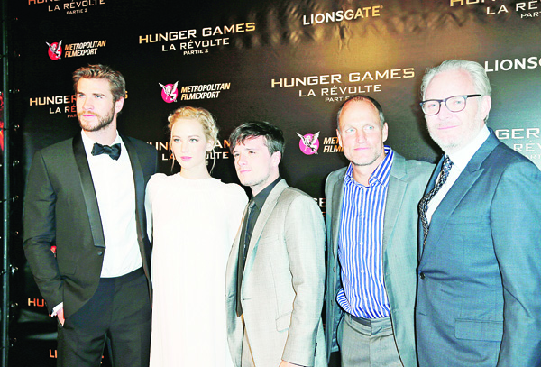 In this Nov 9 file photo (from left), Australian actor Liam Hemsworth, US actress Jennifer Lawrence, British actor Sam Claflin, US actor Woody Harrelson and US director Francis Lawrence pose for photographers at the premiere of the film ‘The Hunger Games: Mockingjay Part 2’, in Paris.(AP)