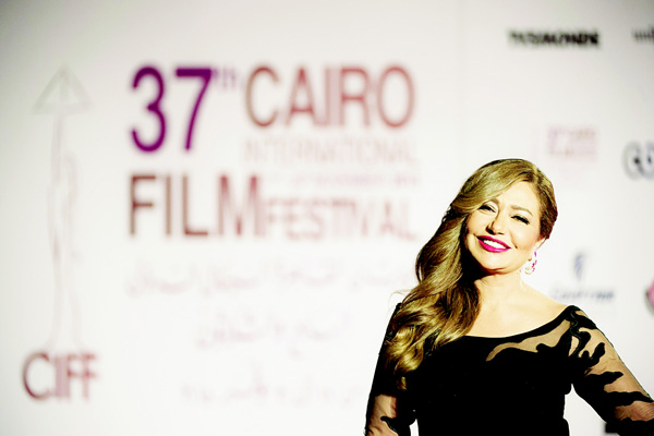 Egyptian film star Leila Elwi poses for photographers at the opening ceremony of the 37th Cairo International Film Festival at the Cairo opera house in the Egyptian capital on Nov 11. (AFP)