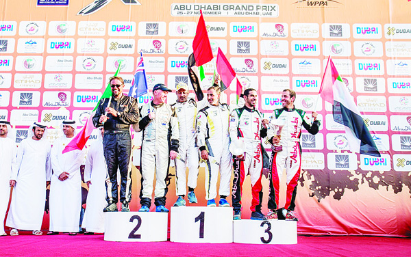 Winners and officials in podium.