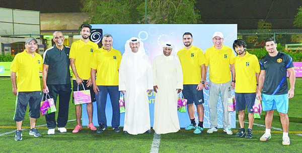 Zain officials with Kuwait national team players