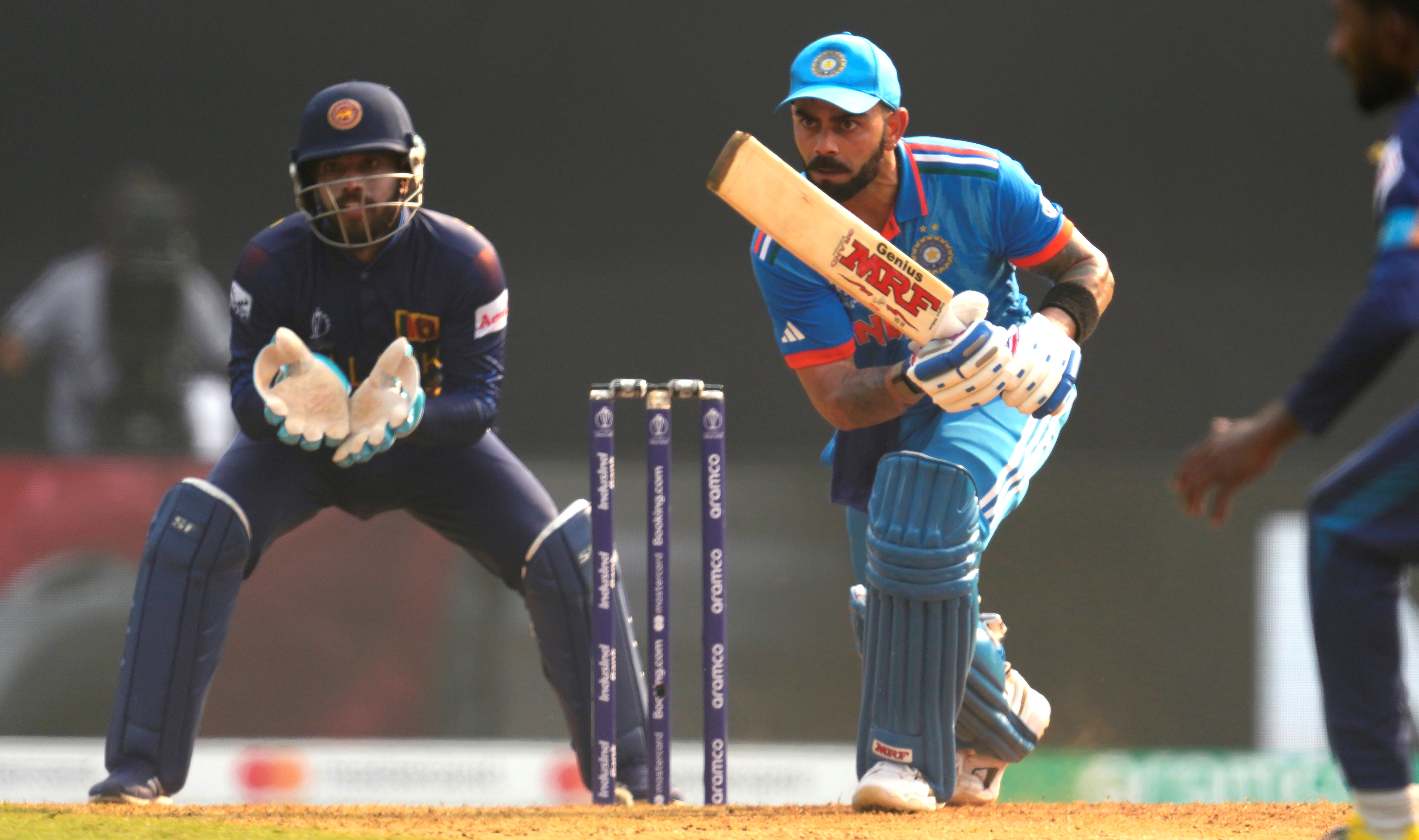 India dismantles Sri Lanka to book a semifinal spot