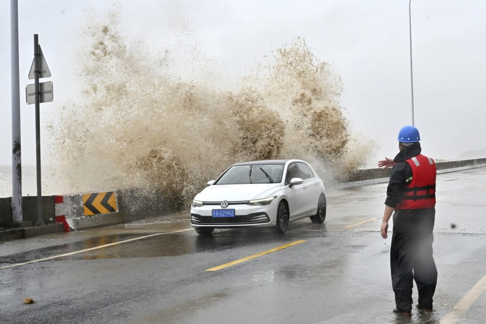 Typhoon Gaemi weakens to a tropical storm as it moves inland carrying rain toward central China
